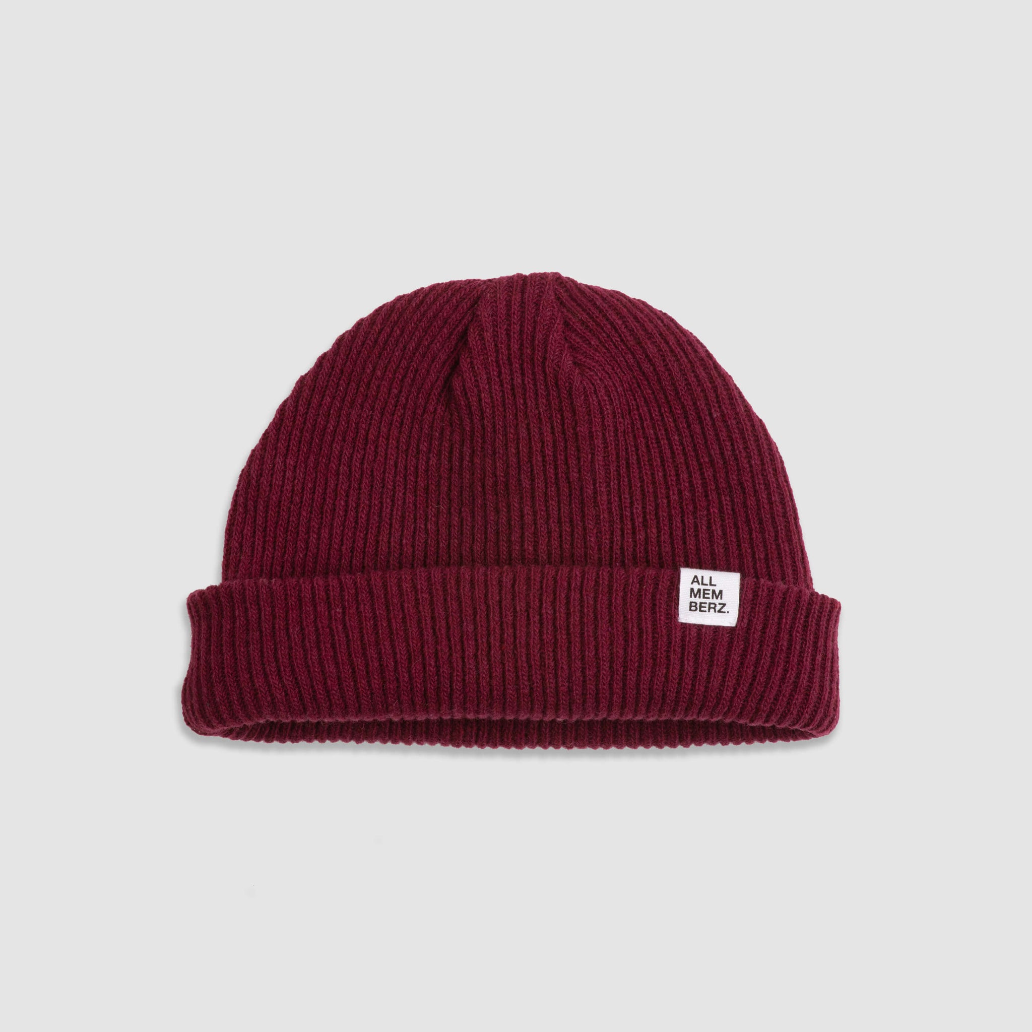 bonnet pour enfant en laine, doux, maille côtelée, couleur prune, étiquette logo Allmemberz