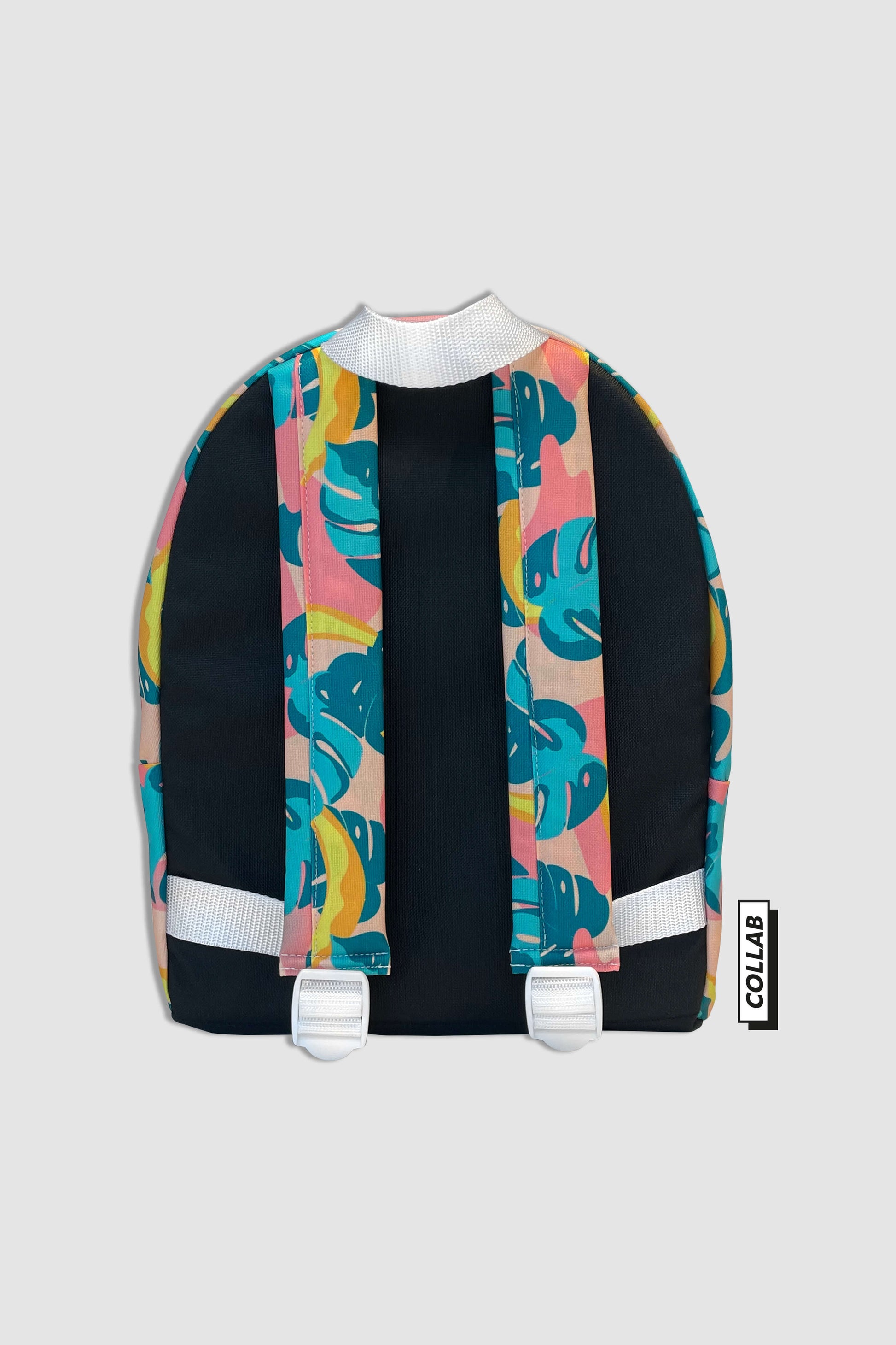 sac à dos pour enfant motif imprimé tropical feuilles et bananes joyeux et coloré, vue de dos, bretelles rembourrées réglables