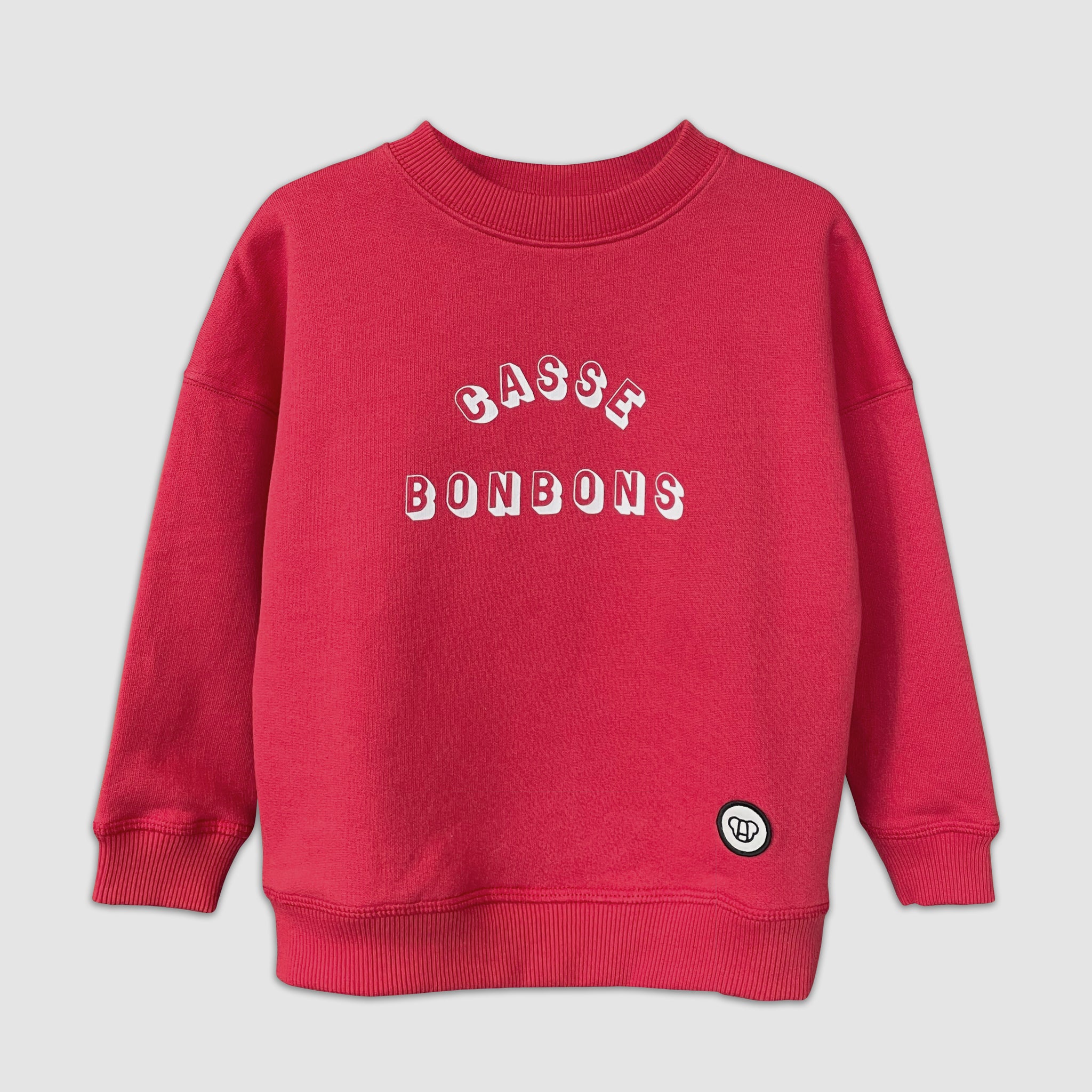 sweat streetwear cool pour enfant, rouge cerise, unisexe, coupe oversize en coton bio, motif imprimé Casse Bonbons
